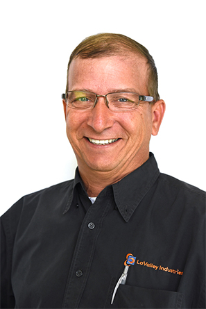 A professional portrait of LaValley Industries employee Craig Larson