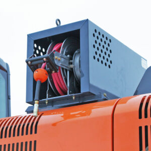 Air Compressor with custom-designed housing seen mounted to excavator in Utility set-up.