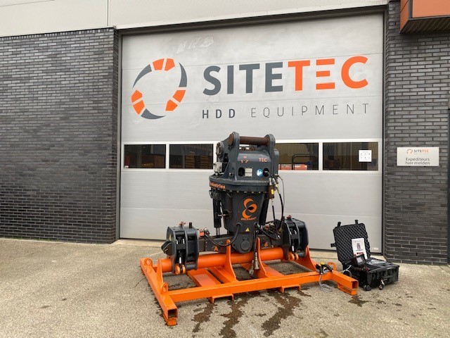 SiteTec and LaValley Industries announce distribution partnership. A DECKHAND® sits in a stand in front of a SiteTec garage door.