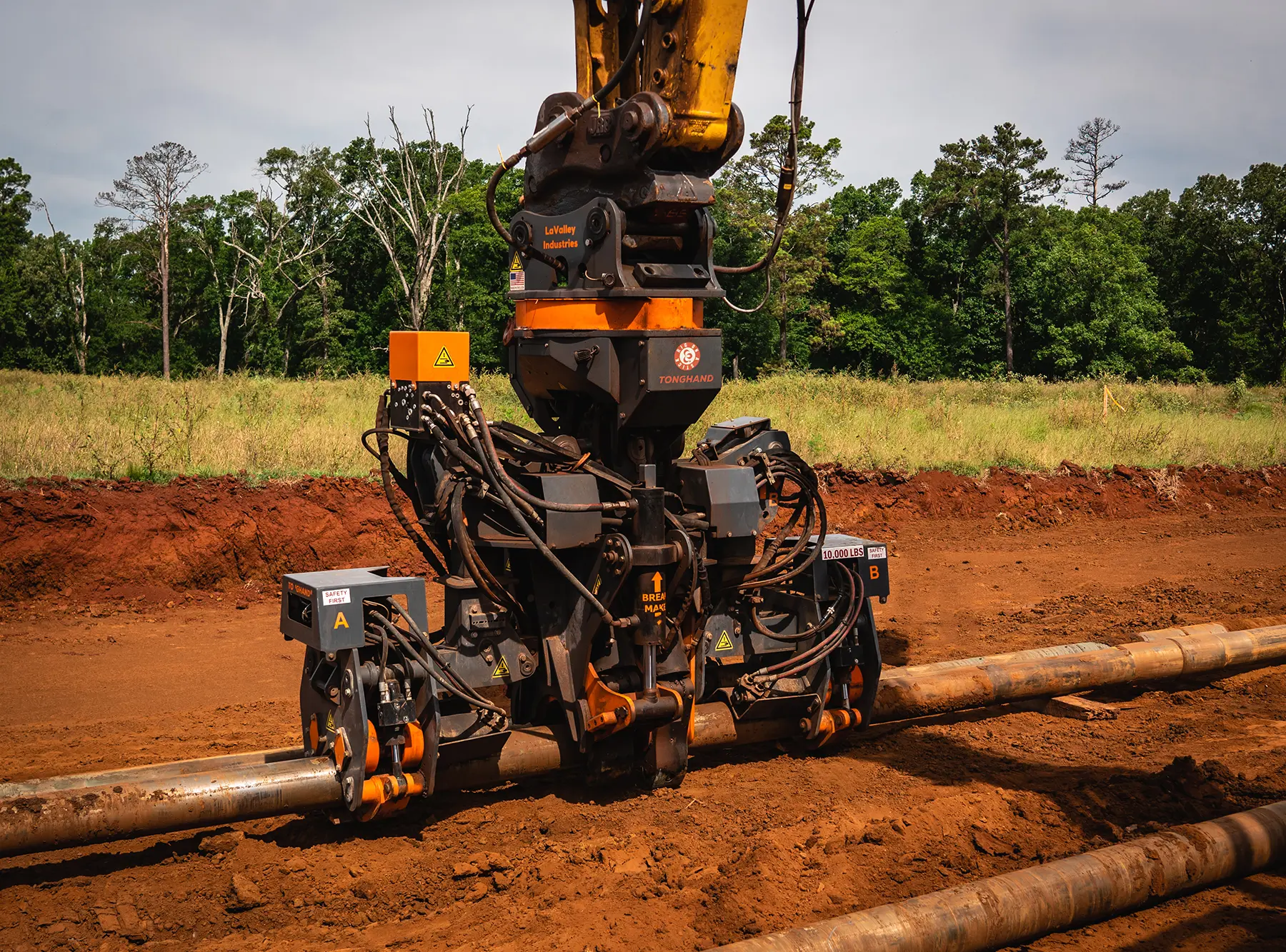 When it comes to the automation of dangerous tasks on the job site, there's nothing safer, faster, or better on the market. See productivity gains of up to 20% or more when you design civil construction projects with DECKHAND® and TONGHAND® excavator attachments.